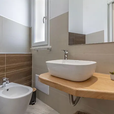 Гостевой дом Nuras - L'azzurra - Double Bedrooms Private Bathroom And Seaview Solarium Сорсо
